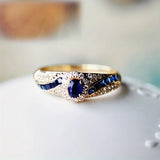 Gold-Tone Blue Crystal Halo Ring