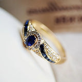 Gold-Tone Blue Crystal Halo Ring