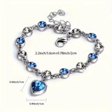 Silver-Tone Blue Crystal Heart Charm Bracelet