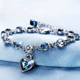 Silver-Tone Blue Crystal Heart Charm Bracelet